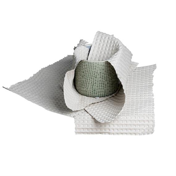 Papier gaufré en boîte distributrice